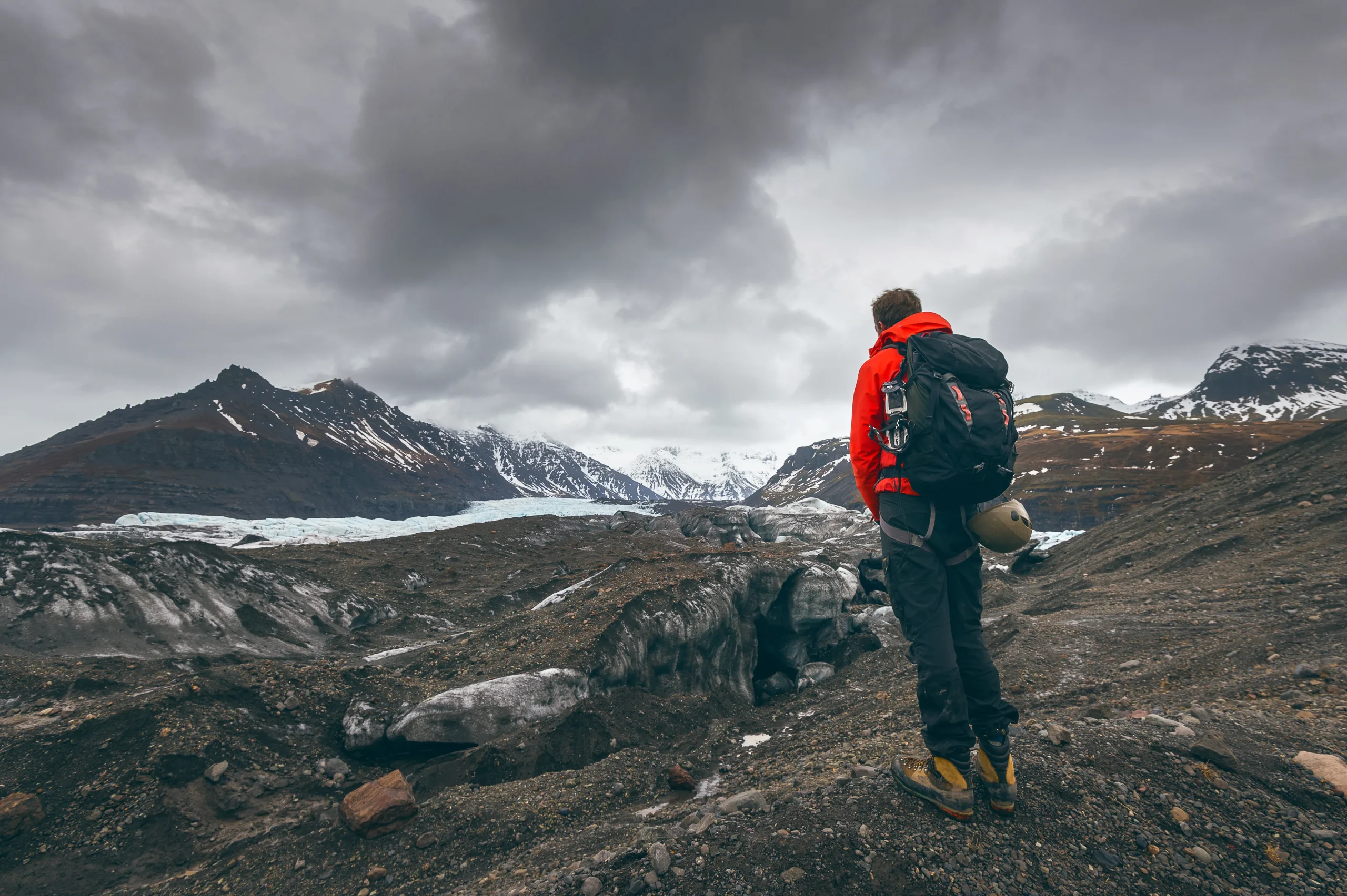 hiking-adventure-travel-man-watching-glacier-iceland